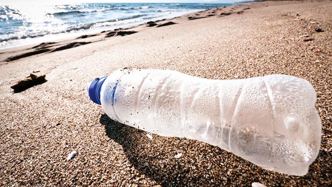 Stock picture_plastic bottle on beach