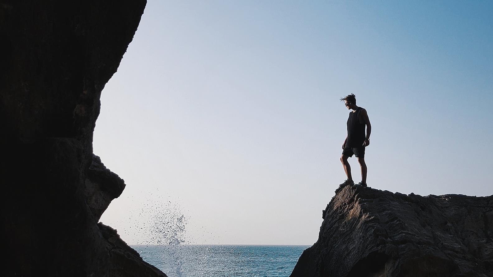 Stock picture_man on cliff